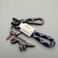 🗝️Aluminum Alloy Dinosaur Charm Paired with a Hand-woven Bracelet-🦖Buy 1 Get 1 Free✨